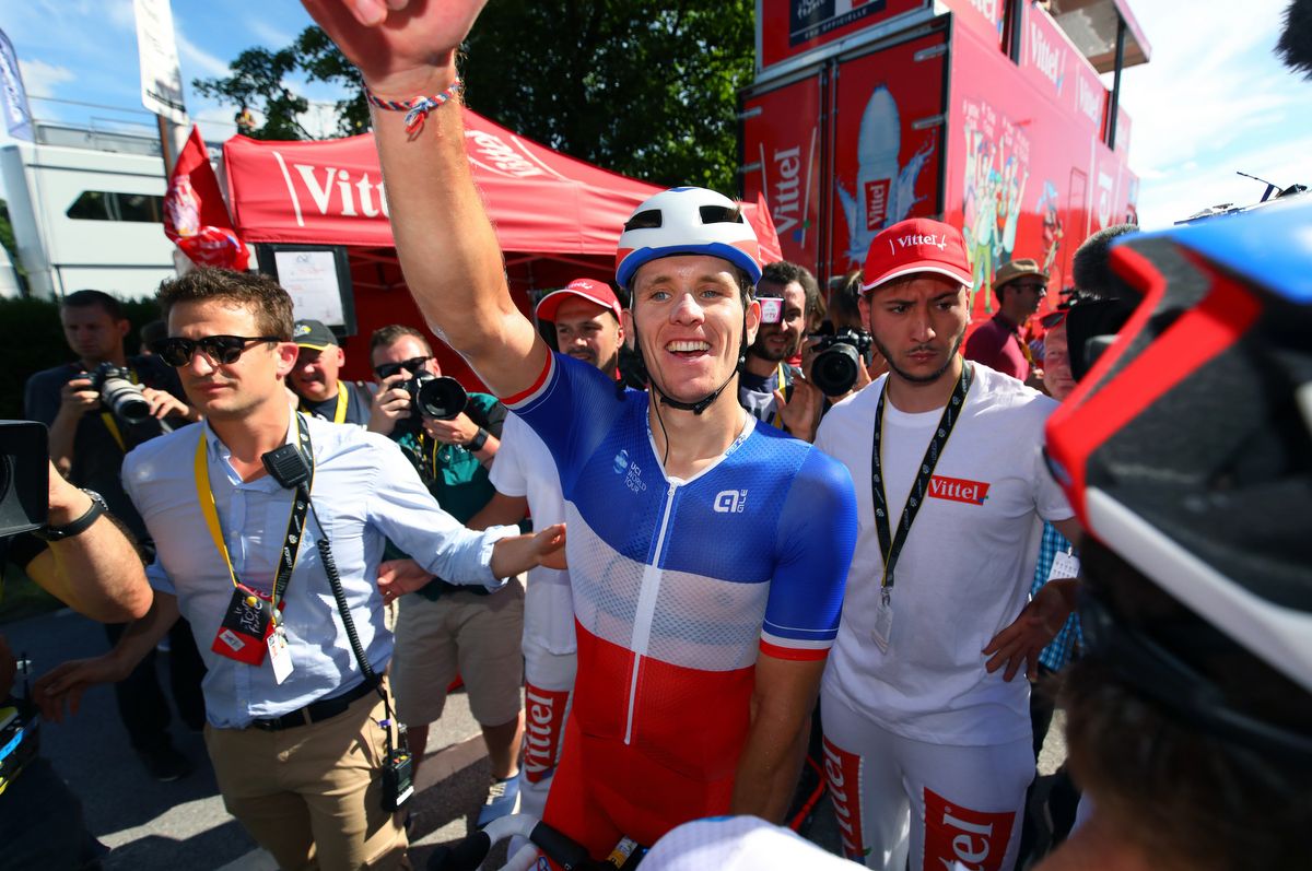 An excited Arnaud Demare looking for his FDJ teammates after the win