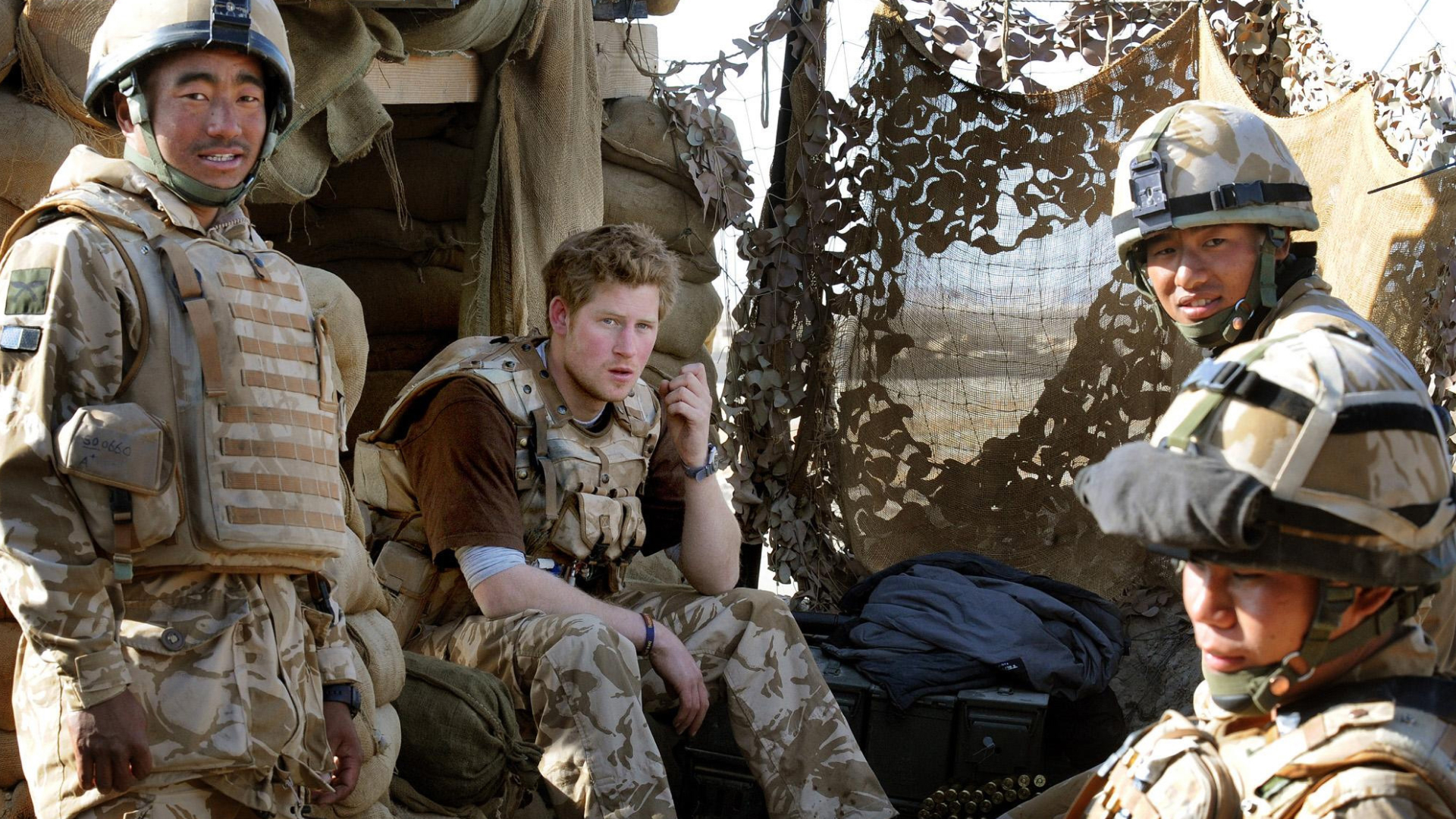 Prince Harry with a group of Gurkha soldiers in Helmand province, Southern Afghanistan on January 2, 2008