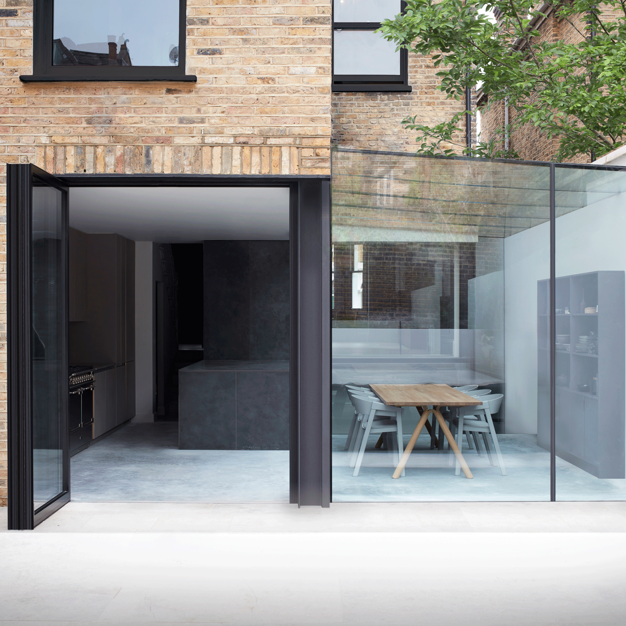 Kitchen in glass box extension