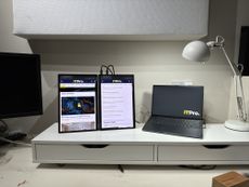 The Asus ZenScreen Duo MQ149CD on a desk