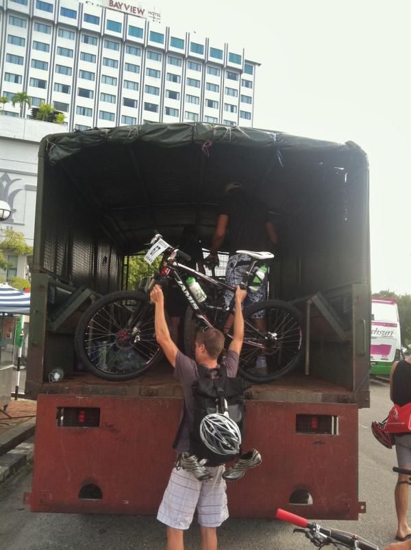 Blake Harlan hands off his bike.