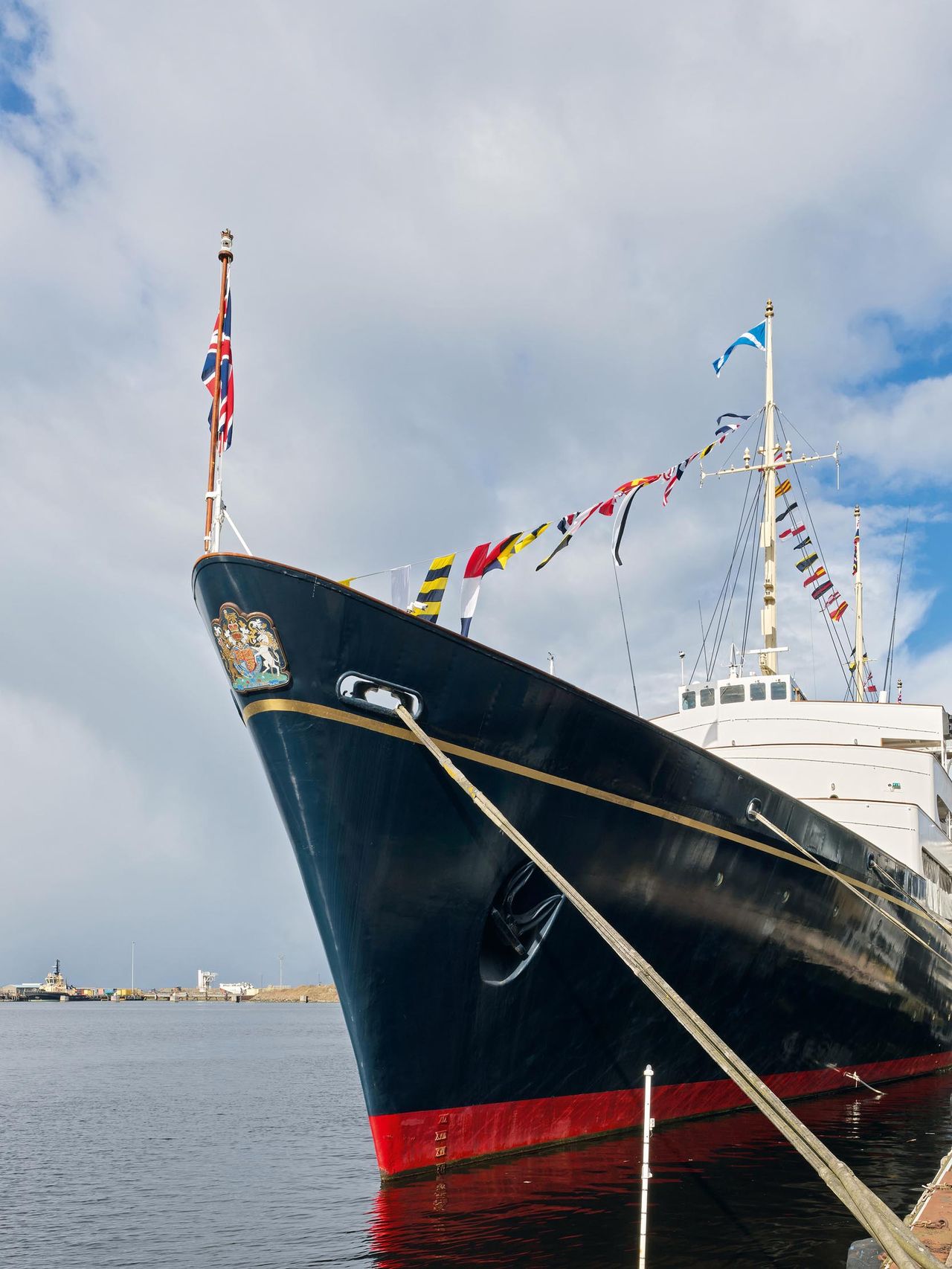 Fig 2: Britannia from the quayside: the blue hull of the yacht, enlivened with a band of gold leaf.