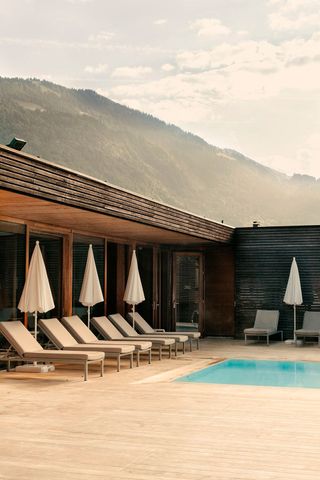 Pool at Susanne Kaufmann spa in Bezau that looks out onto the Alps