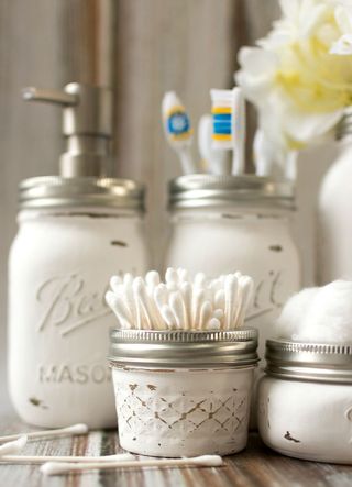 Mason jars used as bathroom storage