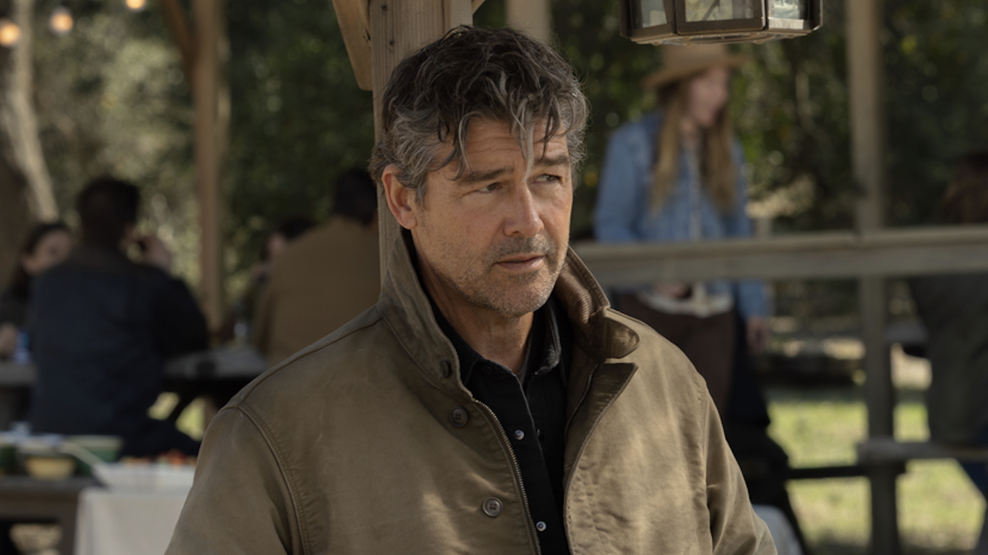 Hal Jordan in brown jacket standing on ranch in Lanterns Season 1