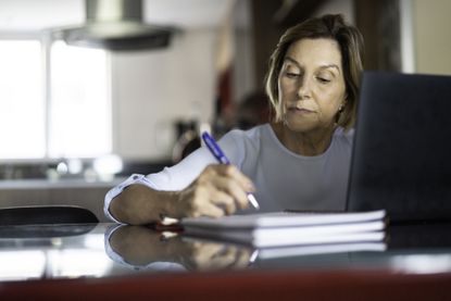 Woman writing her own will