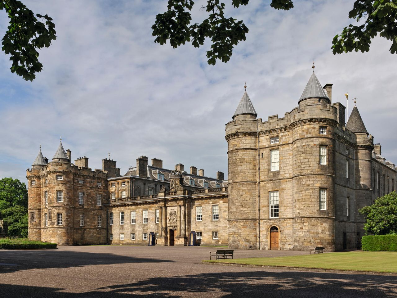 Fig 1: The entrance front at the Palace of Holyroodhouse, Edinburgh. James V&#039;s tower is to the left and its copy is to the right.