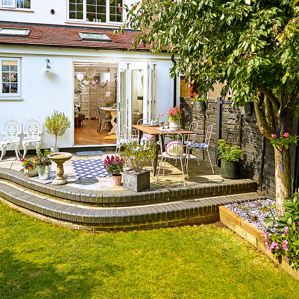 exterior of house green lawn and potted plant