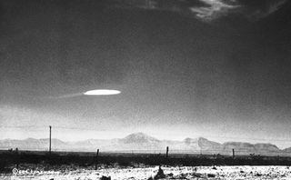A famous photograph taken by a government employee of an unidentified aerial phenomenon over the Holloman Air Development Center on Oct. 16, 1957. The object may have been secret U.S. technology.