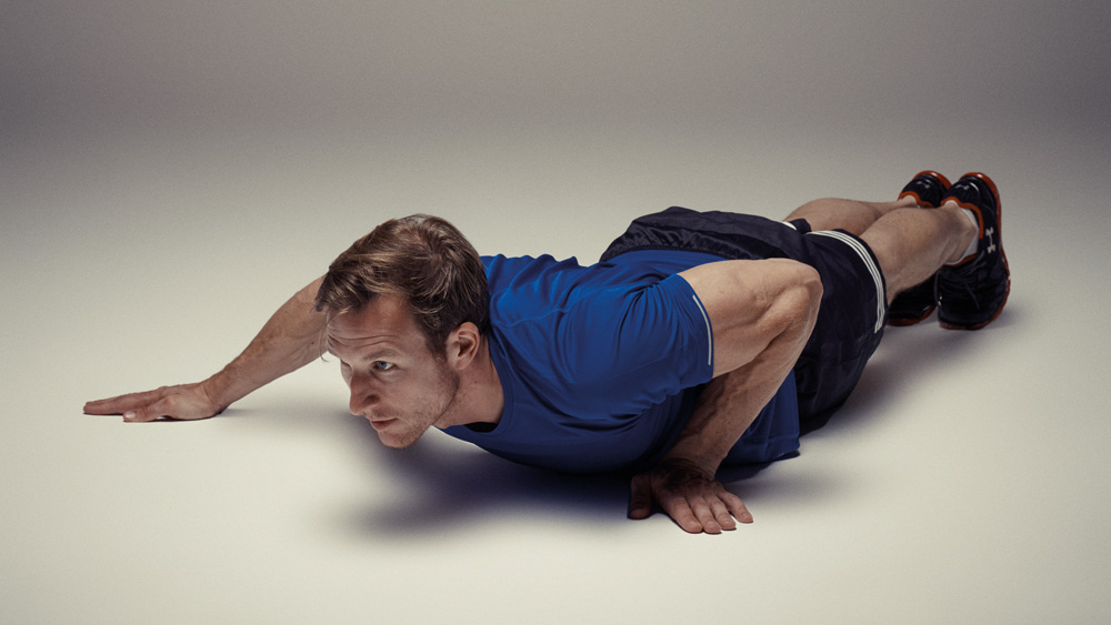 Sean Lerwill demonstrating the side-to-side push-up