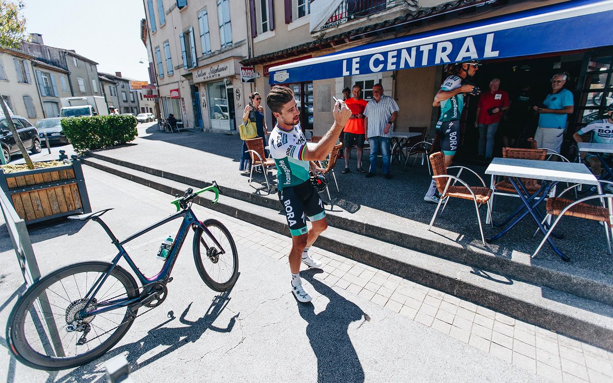 Peter Sagan takes a selfie with his e-bike