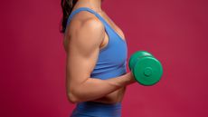 woman performing a biceps curl