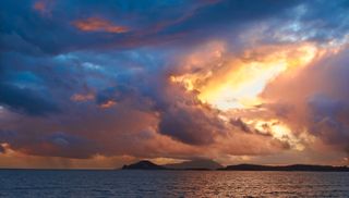 A view of the island of Ischia and the Bay of Naples after a thunderstorm.