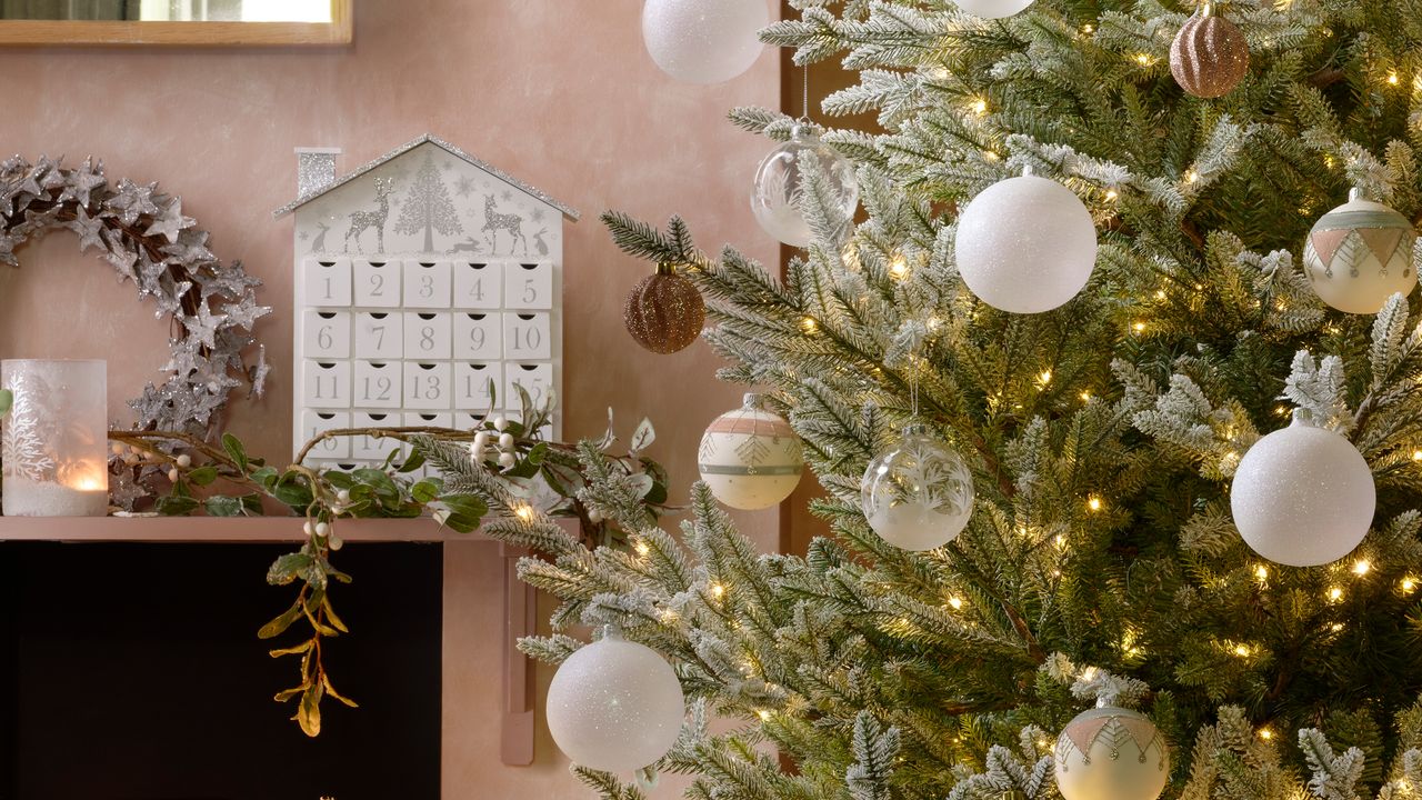 Christmas tree with white and glass baubles