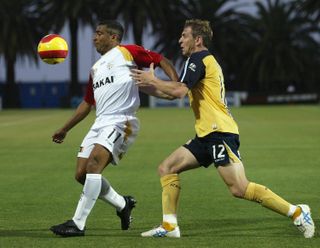 Romario in action for Adelaide United against Central Coast Mariners in November 2006.