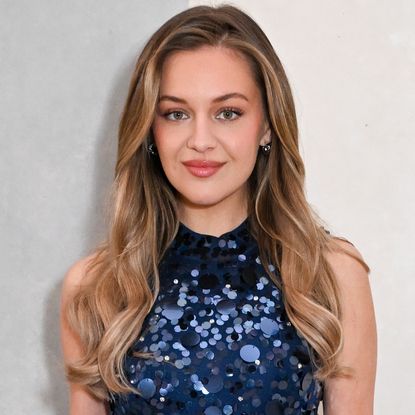 Kelsea Ballerini attended the Carolina Herrera Fall 2026 show in a blue sequin dress