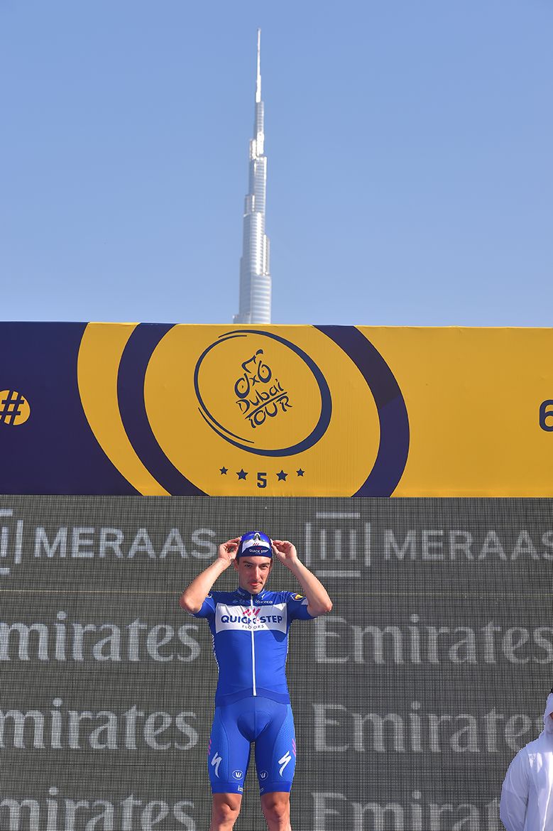 Elia Viviani (Quick-Step Floors) is feted on the Dubai Tour podium.