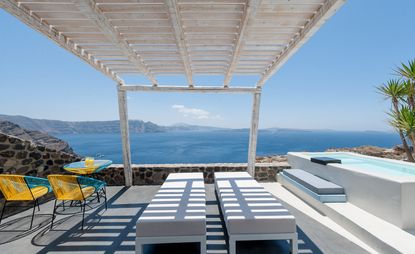 Outdoor seating area overlooking Mediterranean sea