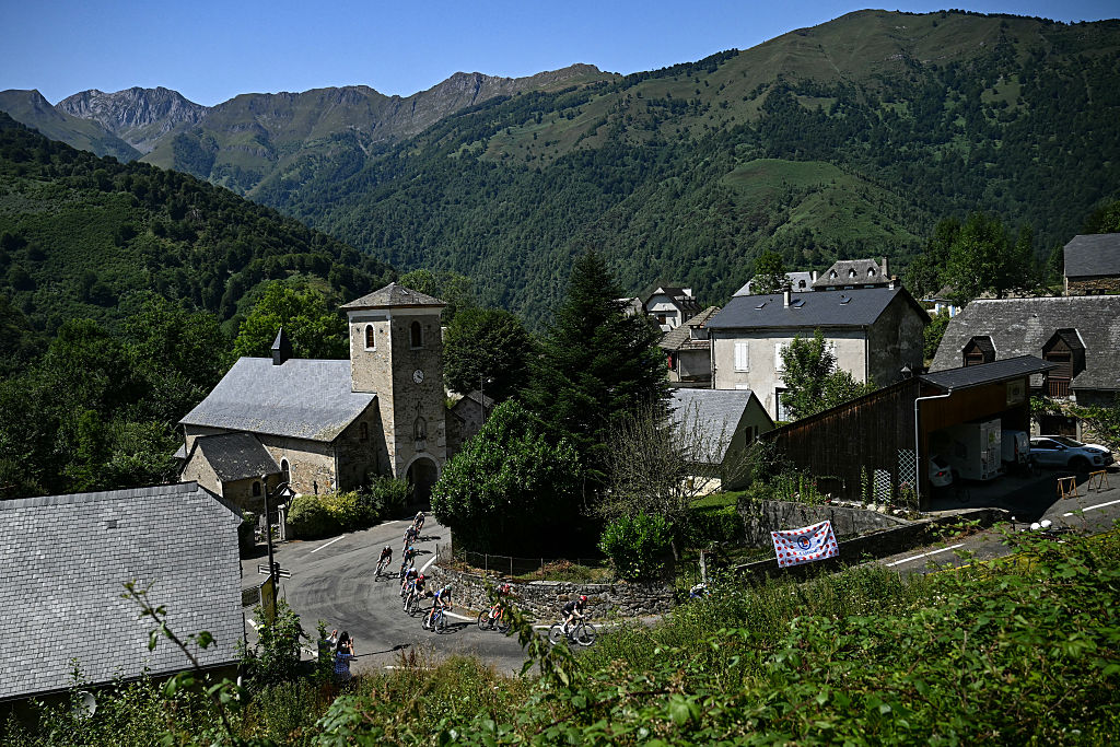 The lead breakaway cycles in the ascent of Col du Soulor during the 12th stage of the 112th edition of the Tour de France cycling race, 180.6 km between Auch and Hautacam, in the Pyrenees mountains of southwestern France, on July 17, 2025. (Photo by Loic VENANCE / AFP)