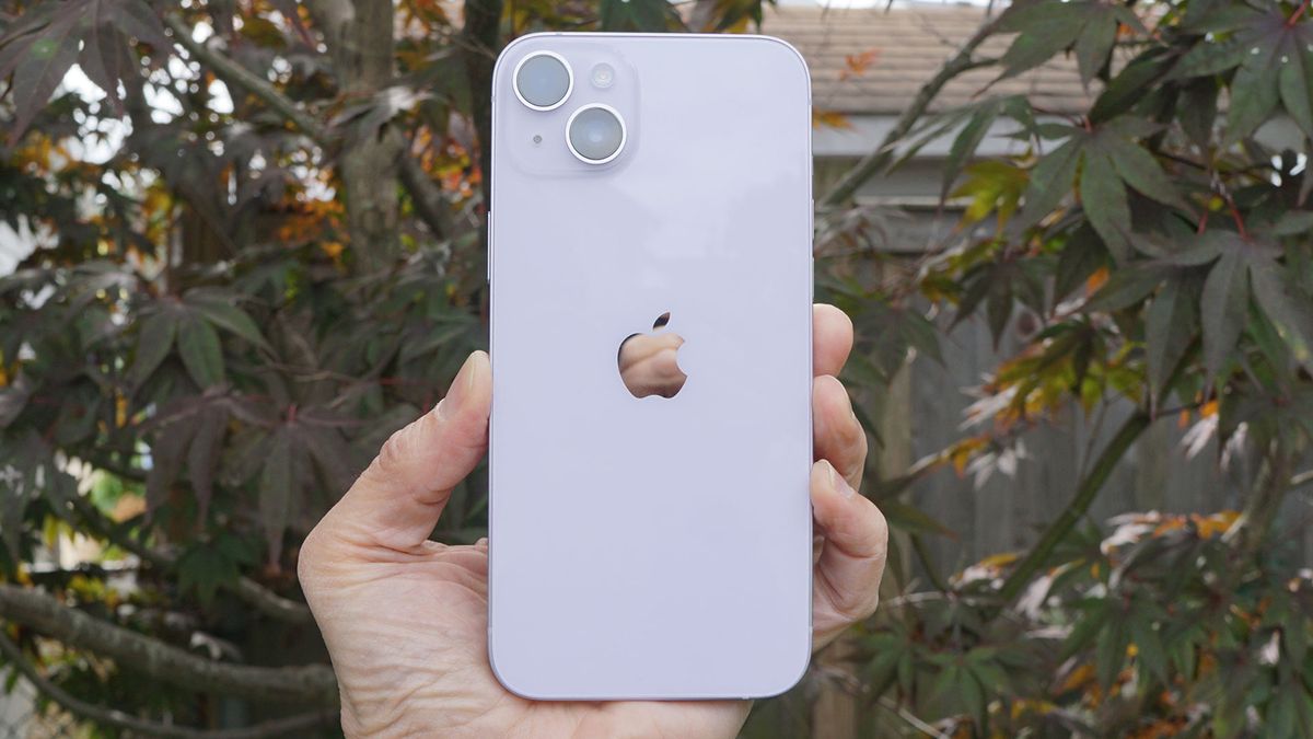 The iPhone 14 Plus from the back, held in a hand