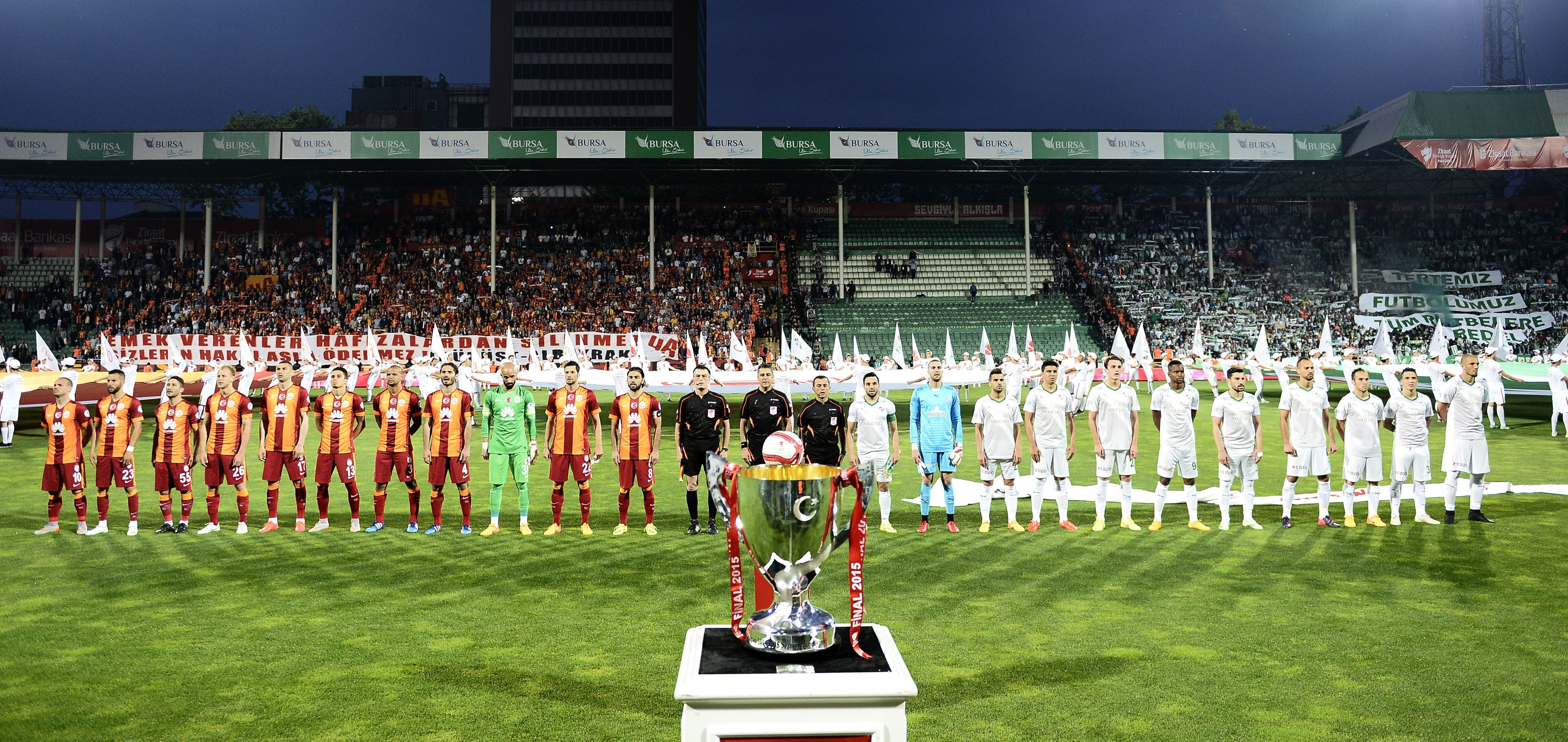 Bursaspor and Galatasaray players line up ahead of the 2015 Turkish cup final at the Bursa Atatürk Stadium.