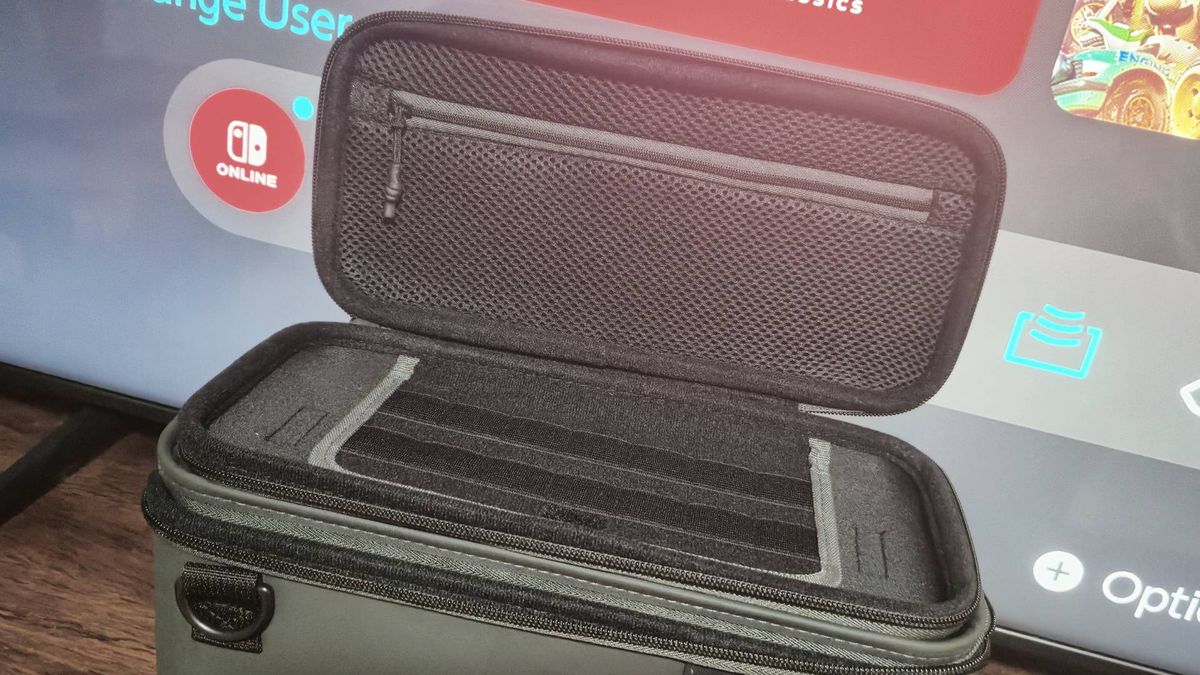 Photo of the top case of the PlayTrek 2-in-1 Switch case open, revealing its game and accessories storage inside.