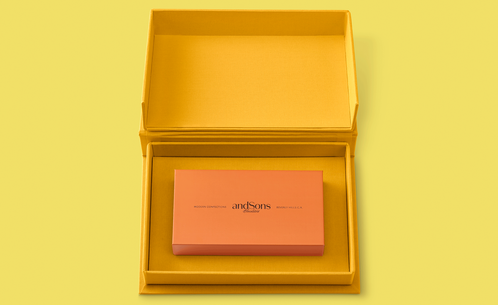chocolate in yellow box against yellow background