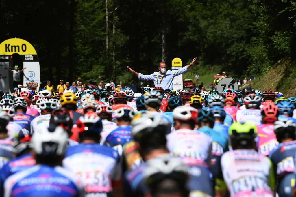 MEGEVE FRANCE JULY 12 Christian Prudhomme of France TDF Director ASO gives the start during the 109th Tour de France 2022 Stage 10 a 1481km stage from Morzine to Megve 1435m TDF2022 WorldTour on July 12 2022 in Megeve France Photo by Alex BroadwayGetty Images