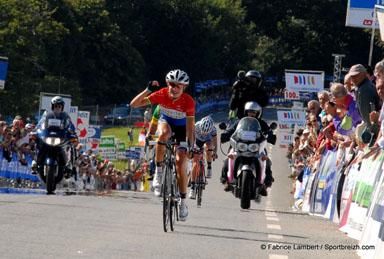 Marianne Vos (Nederland Bloeit) celebrates her teammate Annemiek van Vleuten's victory.