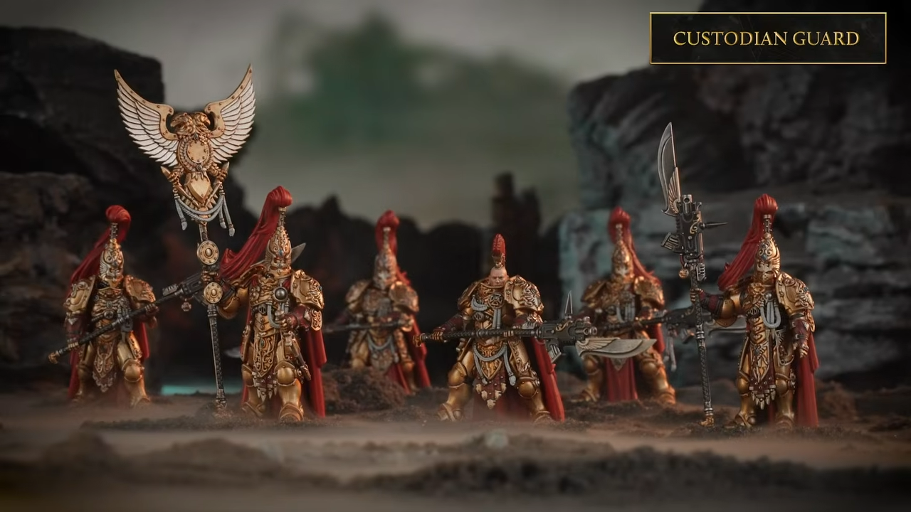 Warhammer Custodes miniatures on a blasted battleground