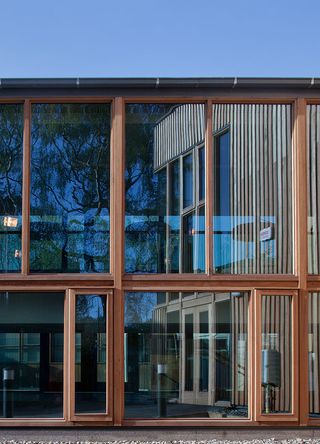 The striking form of the timber clad classroom block