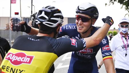 Tim Merlier celebrates victory on stage two of the Giro d'Italia 2021