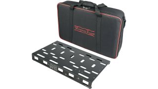 A Voodoo Lab Dingbat Medium pedalboard with carry case