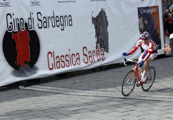 Brutt crosses the line