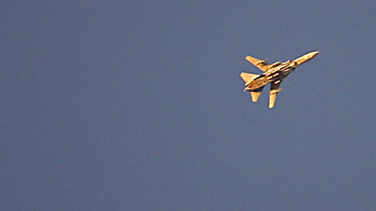 A Syrian fighter jet flying over rebel-held areas