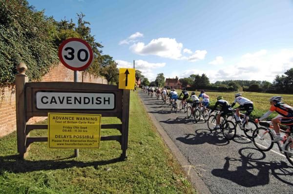 The bunch passes Cavendish... no not that Cavendish.