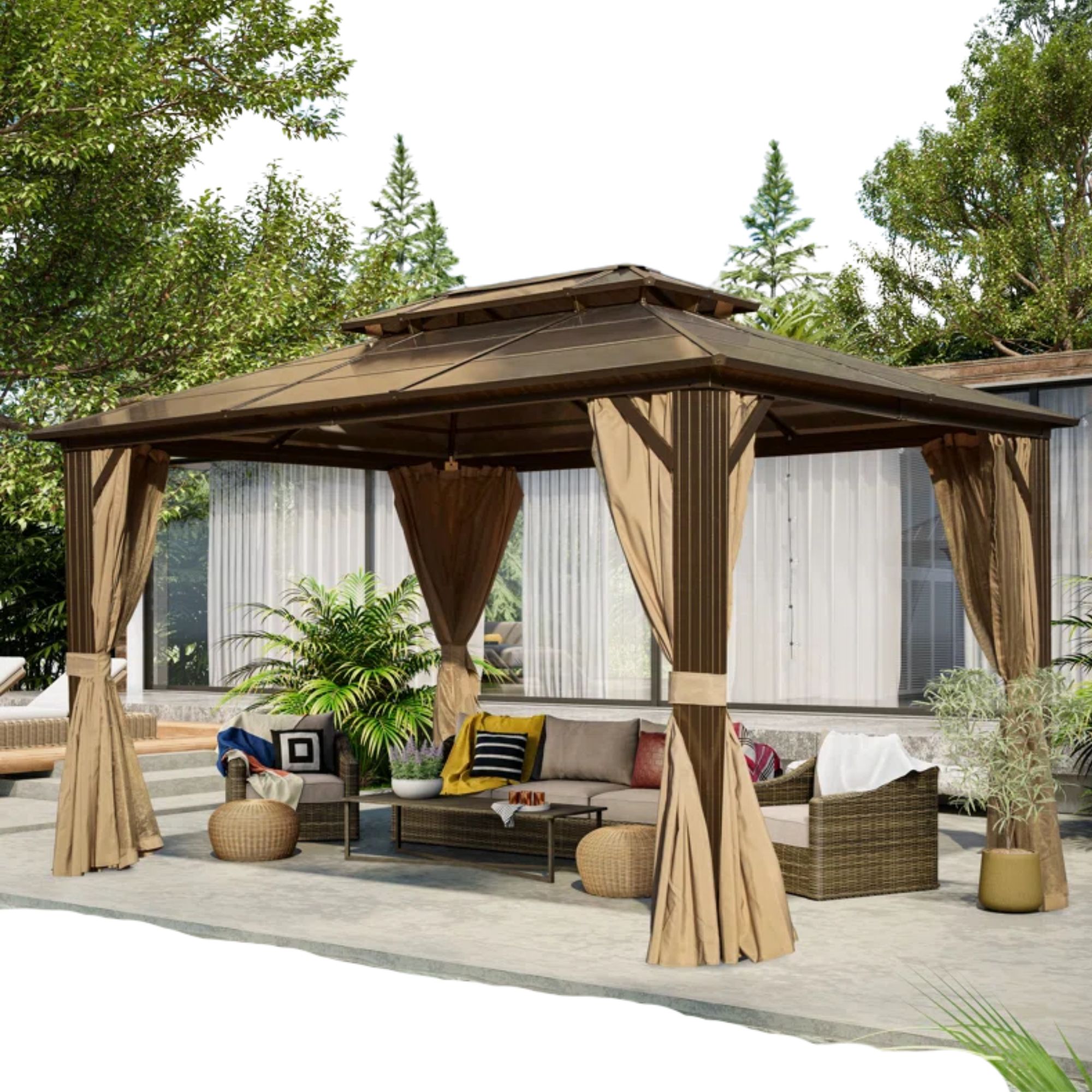 A brown gazebo with rattan furniture underneath it on top of a gray pavement, with trees around it