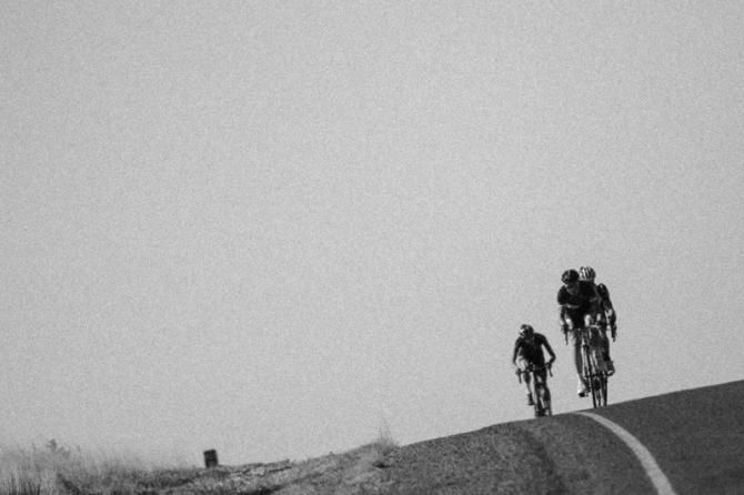 Riders crest one of the many rollers along today's route.