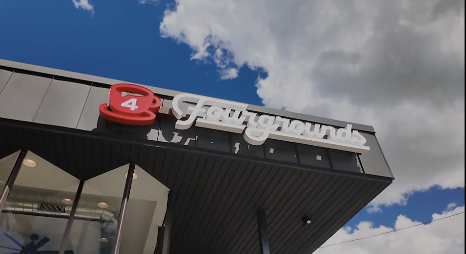 Graham Media shot of Fourgrounds Logo on a building