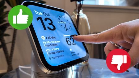 A person interacting with Apple's HomeView smart display with a thumbs up and thumbs down for buy or skip