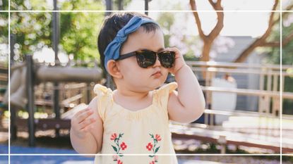 baby with sunglasses on illustrating cool baby names