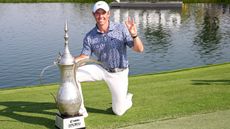 Rory McIlroy with the trophy after winning the 2023 Dubai Desert Classic