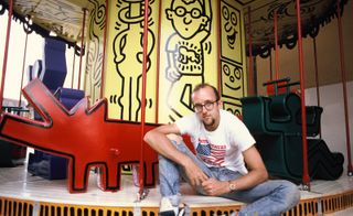 man at Keith Haring fairground ride