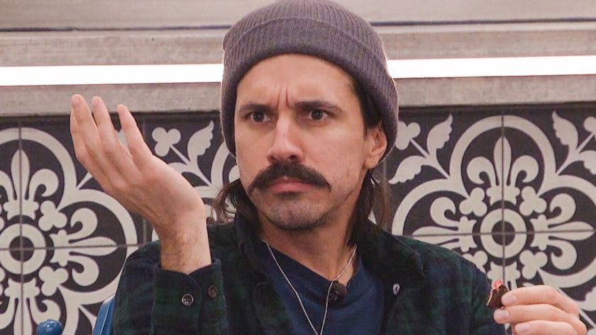 Vince holding up his hands in confusion