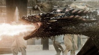 A dragon breathing fire in house of the dragon thex game of thrones prequel