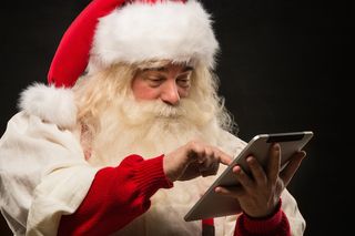 Santa with a tablet.