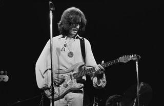 George Harrison plays his "Rocky" Fender Strat on the Dark Horse tour, 1974.