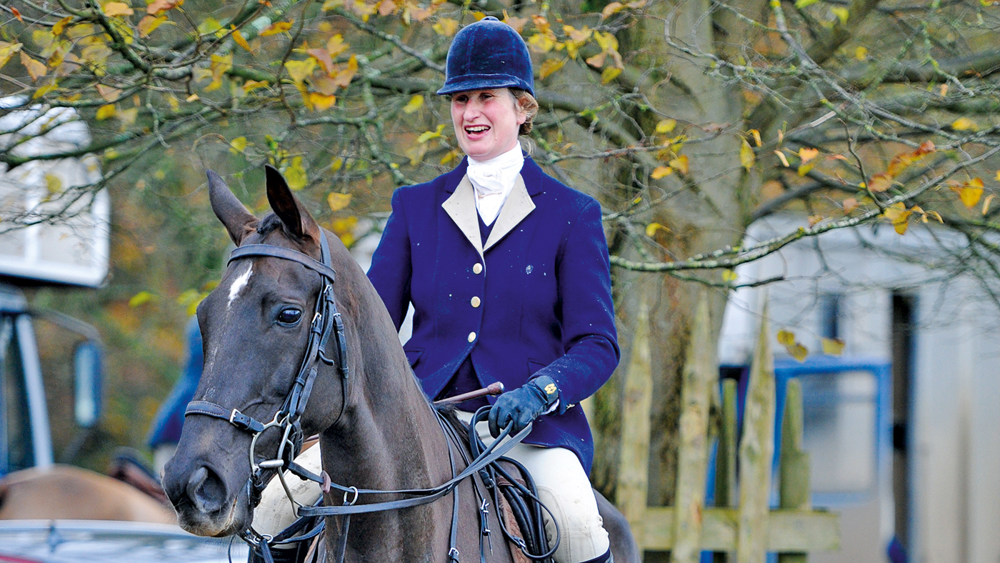 Charlotte Alexander and Denman of the Duke of Beaufort's Hunt running, 17 November 2012