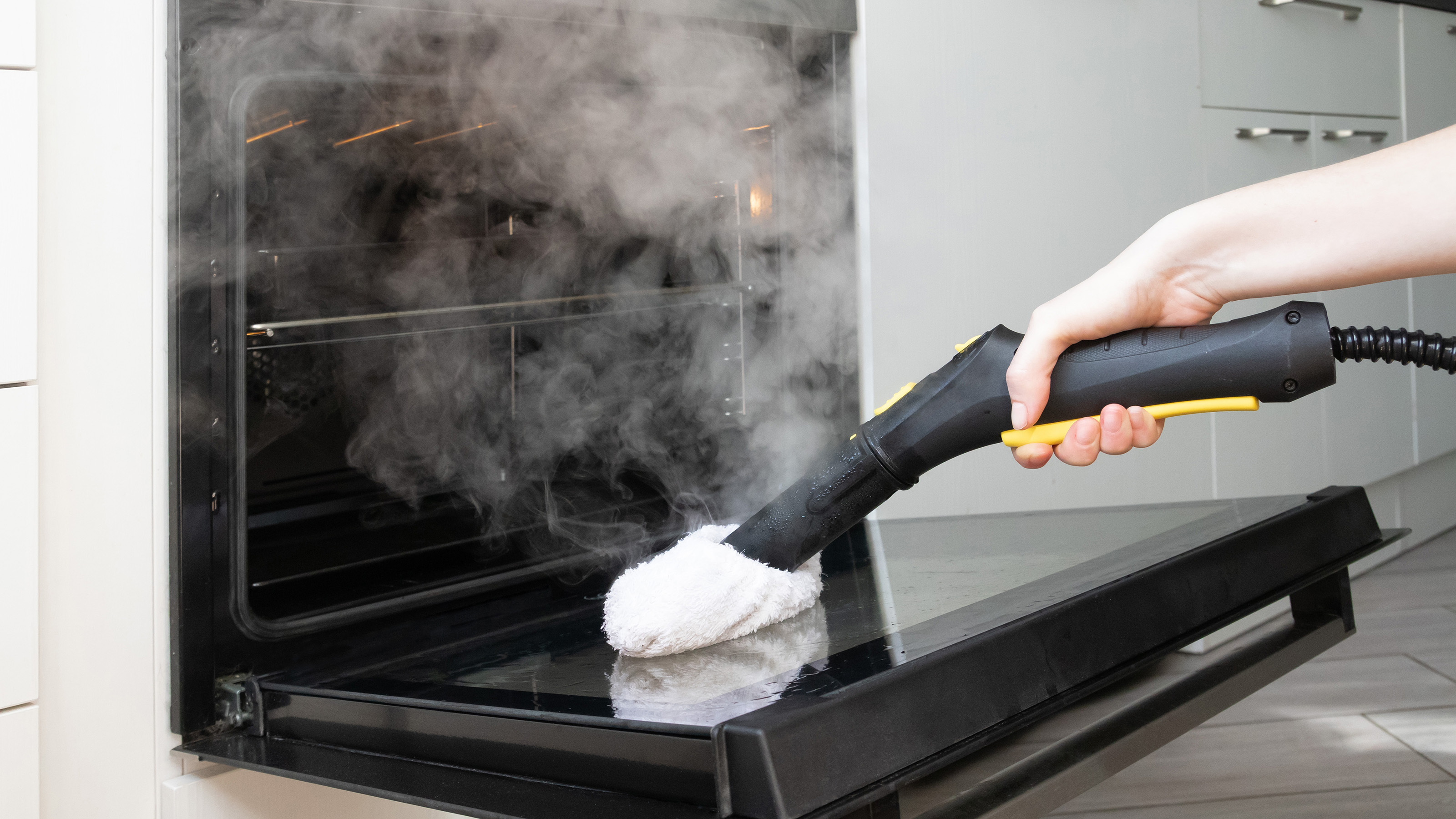 steam cleaning an oven