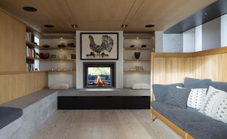 Couch, fireplace, wooden floors in Scottish Highland's residence